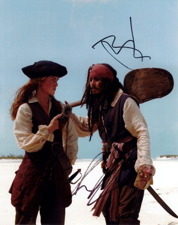 Johnny Depp & Keira Knightley &mdash; Pirates of the Caribbean (Jack Sparrow & Elizabeth Swann) &mdash; signed 11&times;14 photo